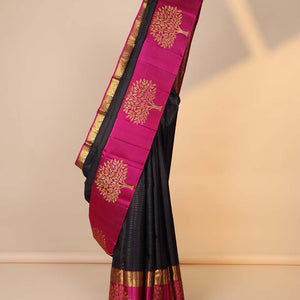Purple zari striped silksaree, contrast floral jaal pallu & border of rekku,vanki,kodi visiry & tree designs