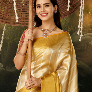 Gold jacquard silk saree, contrast intricate pallu & zari highlighted border steeped with traditional designs