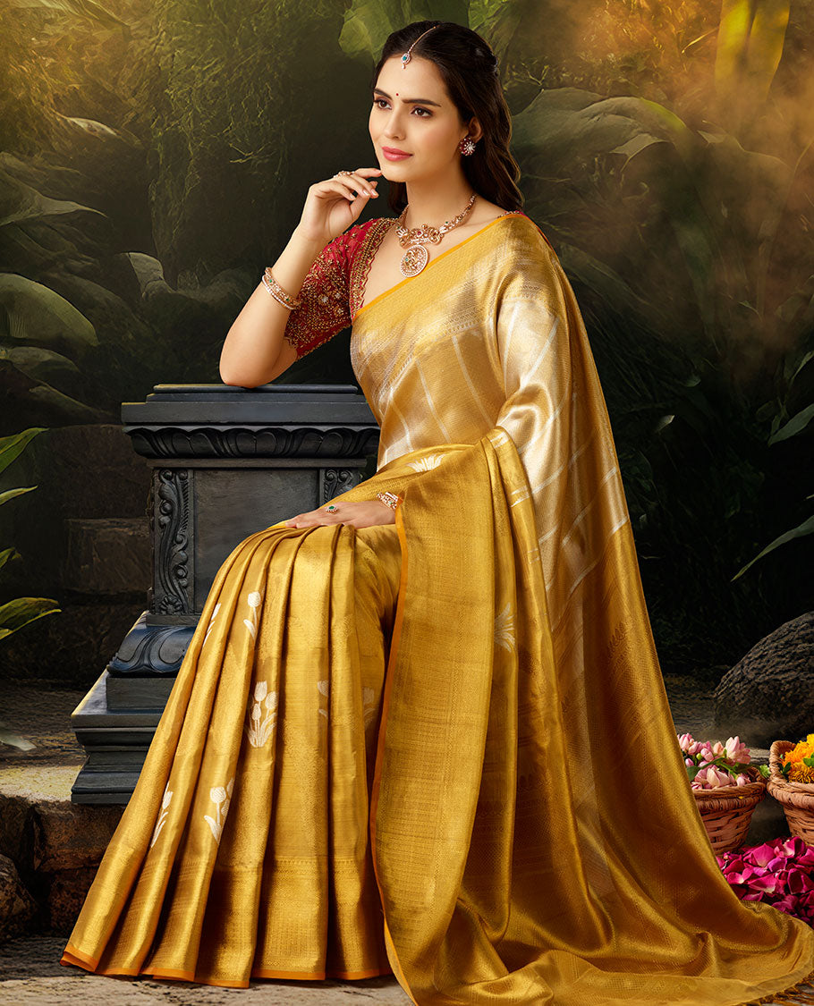 Gold jacquard silk saree, contrast intricate pallu & zari highlighted border steeped with traditional designs