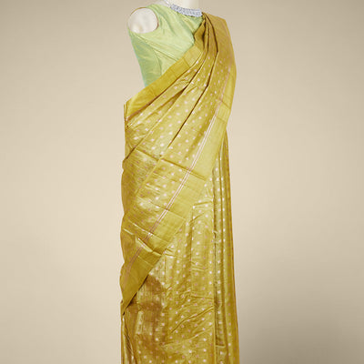 Mustard tusser silk saree with zari buttas, zari striped border