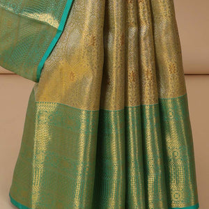 Gold jacquard Kanchipuram tissue silk saree, contrast jaal pallu & border of thilakam,kathir & intricate designs