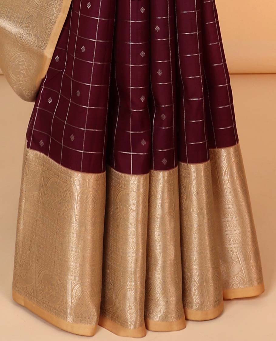 Maroon buttas & checked silk saree, contrast intricate pallu & border steeped with traditional zari motifs