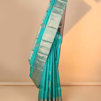 Blue zari buttas silk saree, zari border of manga,kamalam,muthu,mayil & yaanai & contrast intricate pallu