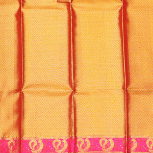 Orange jacquard pure silk half saree,jaal dhavani,contrast jacquard blouse & border of thilakam,muthu,mayil & mayil kann