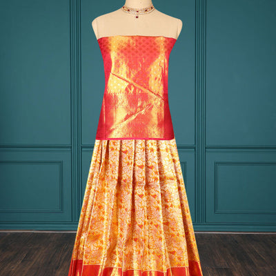 Orange jacquard pure silk half saree,jaal dhavani,contrast jacquard blouse & border of thilakam,muthu,mayil & mayil kann