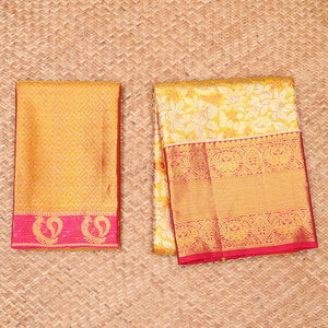 Orange jacquard pure silk half saree,jaal dhavani,contrast jacquard blouse & border of thilakam,muthu,mayil & mayil kann