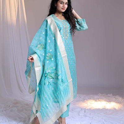 Blue readymade suit,zari buttas & embroidery round-neck tissue top,plain pants & dupatta of floral & chevron print