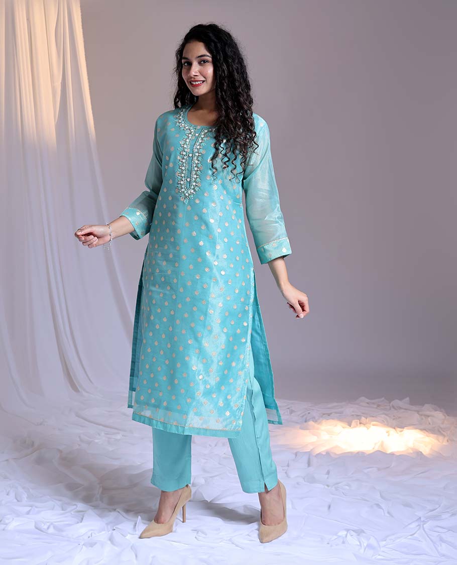 Blue readymade suit,zari buttas & embroidery round-neck tissue top,plain pants & dupatta of floral & chevron print