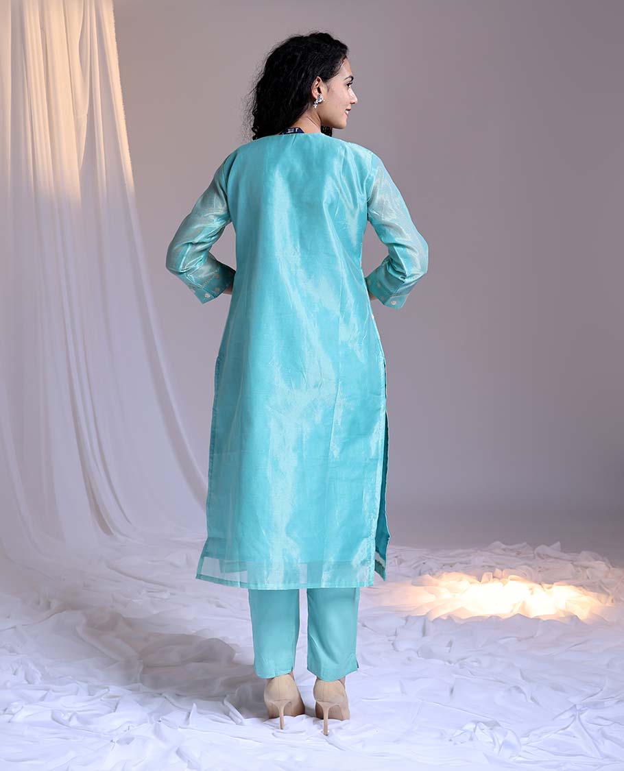 Blue readymade suit,zari buttas & embroidery round-neck tissue top,plain pants & dupatta of floral & chevron print