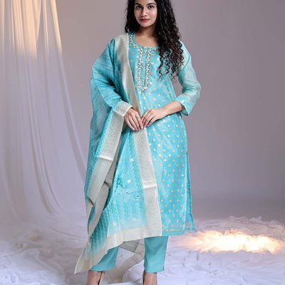 Blue readymade suit,zari buttas & embroidery round-neck tissue top,plain pants & dupatta of floral & chevron print