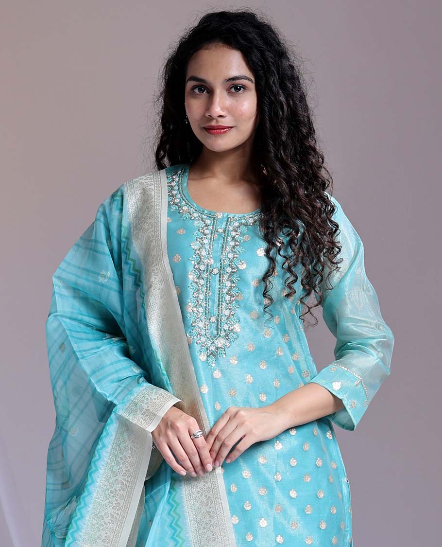 Blue readymade suit,zari buttas & embroidery round-neck tissue top,plain pants & dupatta of floral & chevron print