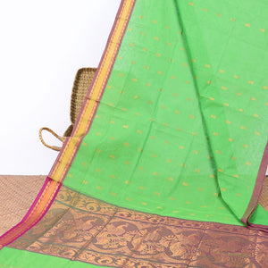 Green Andhra cotton saree with buttas, contrast traditional design border & peacock design pallu