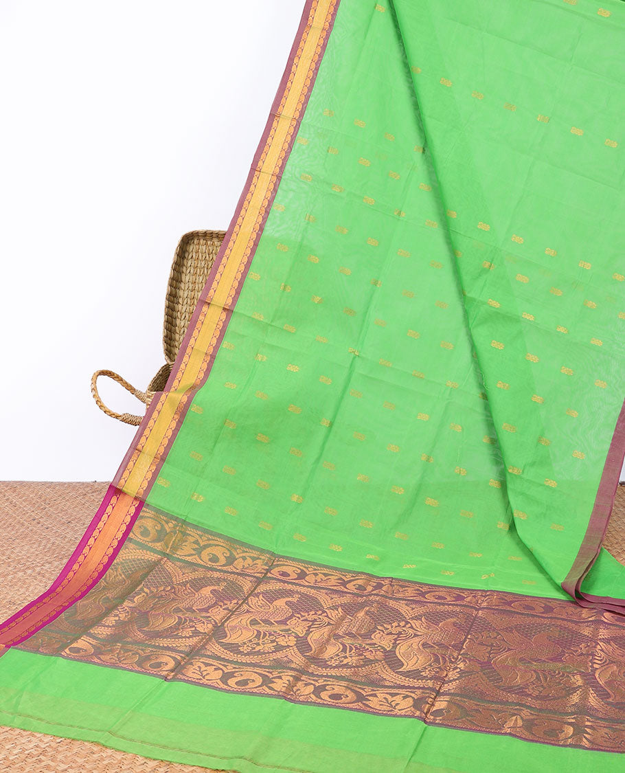 Green Andhra cotton saree with buttas, contrast traditional design border & peacock design pallu