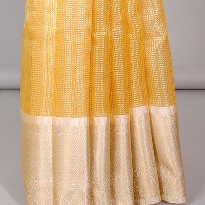 Yellow checked semi-banaras tissue saree, contrast traditional zari design border & intricate pallu