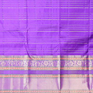 Yellow buttas enclosed with checked silk saree with contrast border of muthu,paun,banaras deisgn & intricate zari pallu