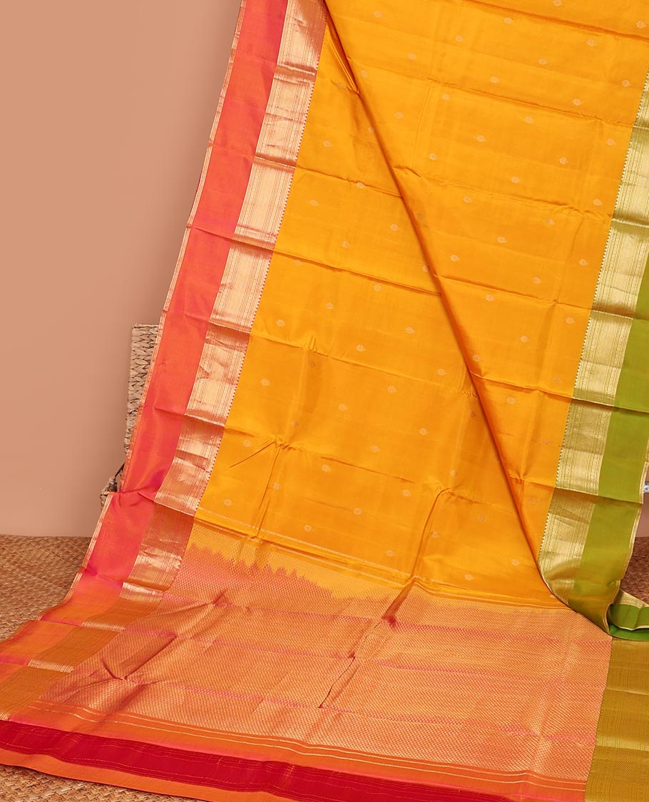Yellow zari buttas silk saree, contrast ganga jamuna border of muthu, poun & kuyil kann &  pallu of intricate designs