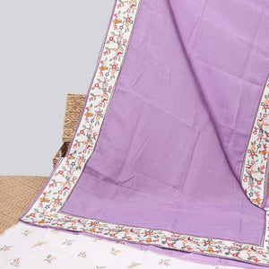 Violet plain design crushed tissue saree, contrast floral & bird design border & pallu