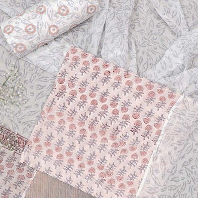 Peach material chudidhar set, floral motifs printed top, contrast bottom & dupatta of floral print