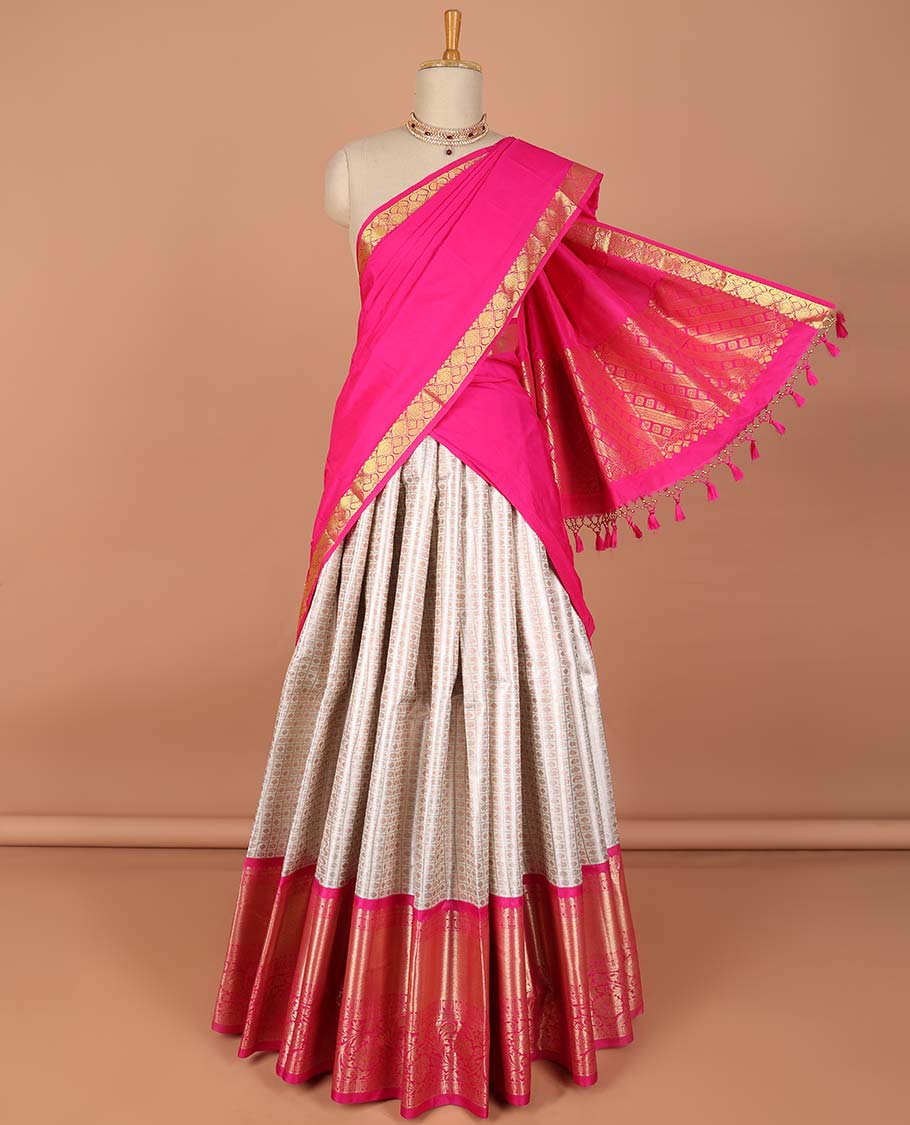 Cream checked with floral design art-silk half saree, contrast traditional zari border, zari design blouse & intricate dhavani