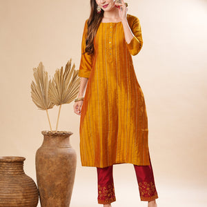 Solid Pin-Tucks Kurta with Resham & Sequins Embroidered Pants - Mustard