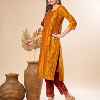 Solid Pin-Tucks Kurta with Resham & Sequins Embroidered Pants - Mustard