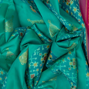 Cyan Handloom Kanchipuram Silk Saree With Ikat Floral Motifs