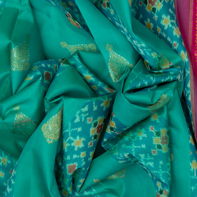 Cyan Handloom Kanchipuram Silk Saree With Ikat Floral Motifs