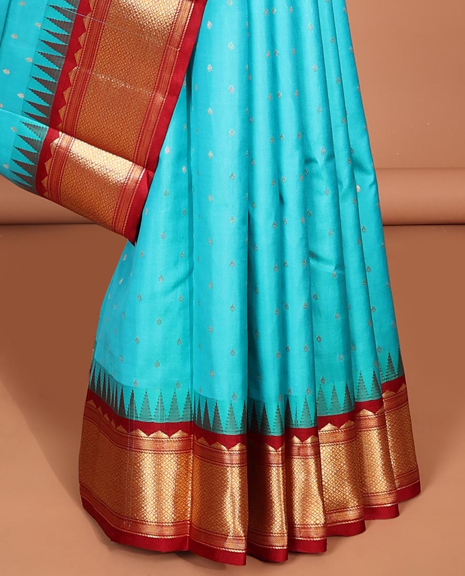 Blue buttas silk saree, contrast border of rekku,banaras & jaal & pallu of ogee pattern