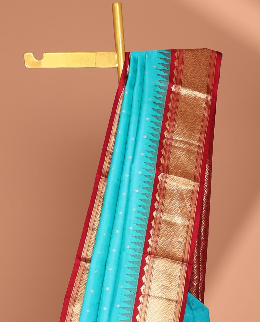 Blue buttas silk saree, contrast border of rekku,banaras & jaal & pallu of ogee pattern