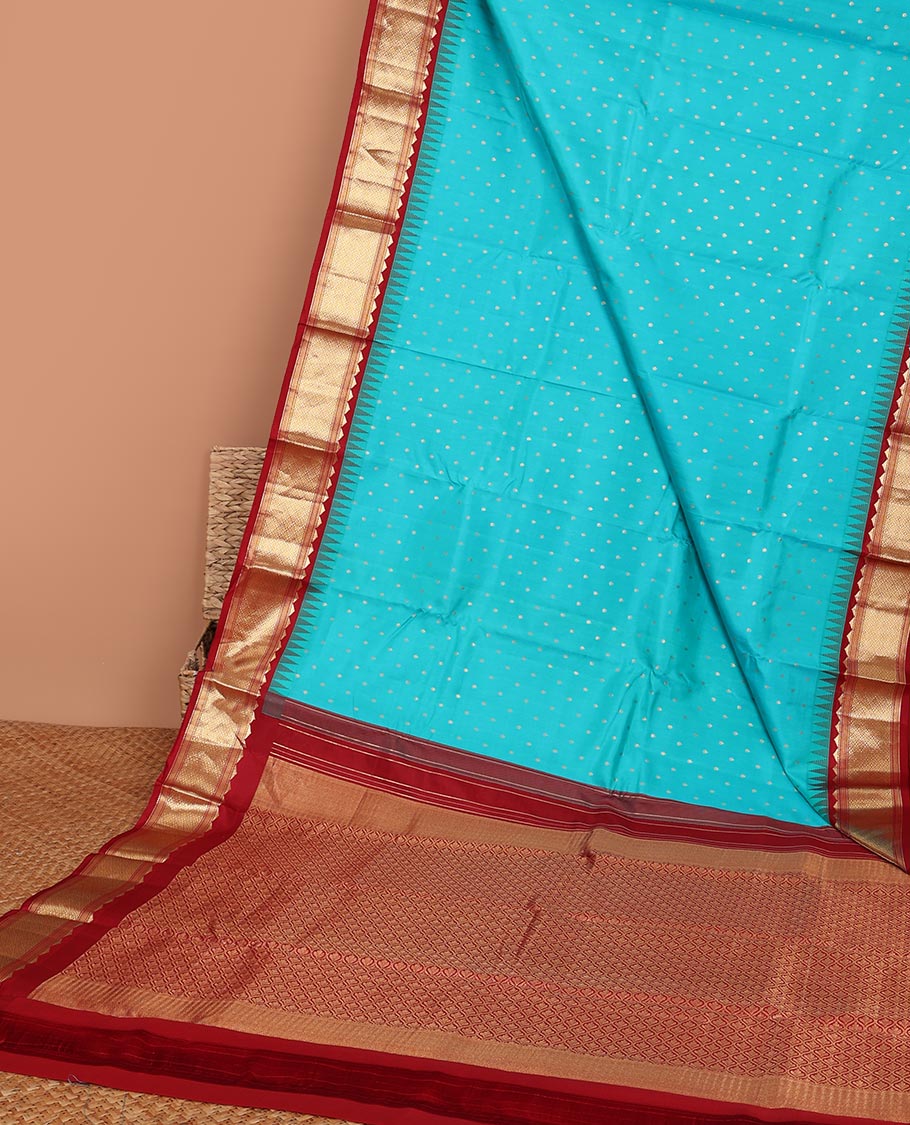 Blue buttas silk saree, contrast border of rekku,banaras & jaal & pallu of ogee pattern