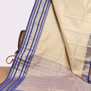 Cream Semi banaras tissue saree with contrast traditional zari border & pallu of intricate design