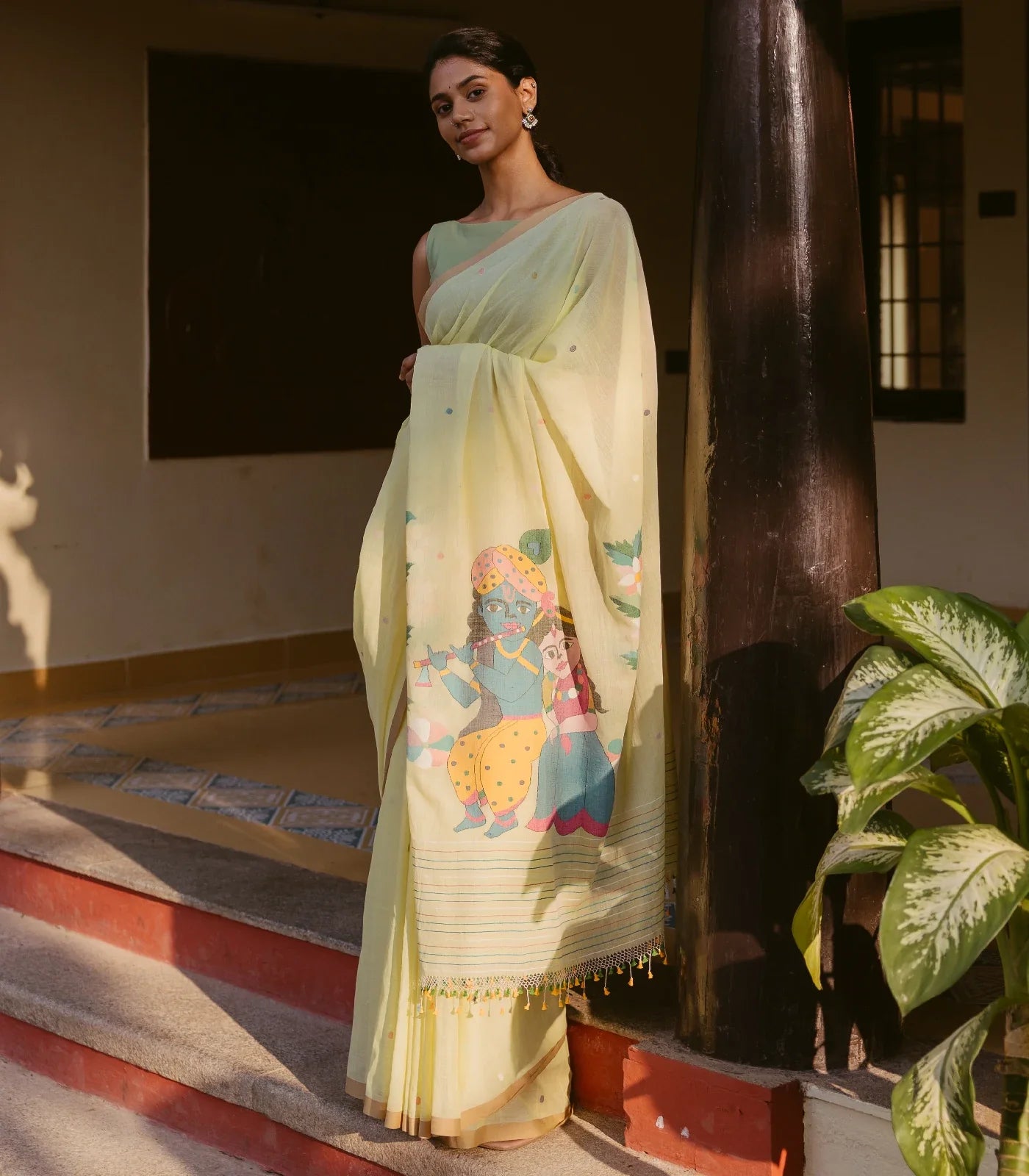 Yellow Handloom Bengal Cotton Saree With Radha Krishna In a Floral Swing Pallu design