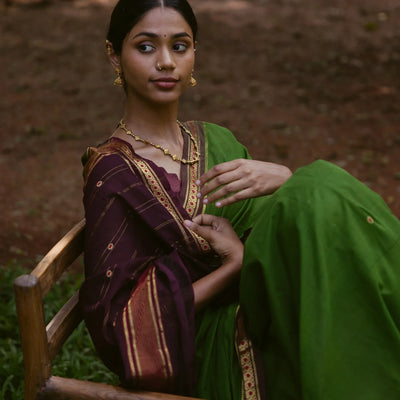 Green Handloom Kadapa cotton saree adorned with red Meenakari buttis