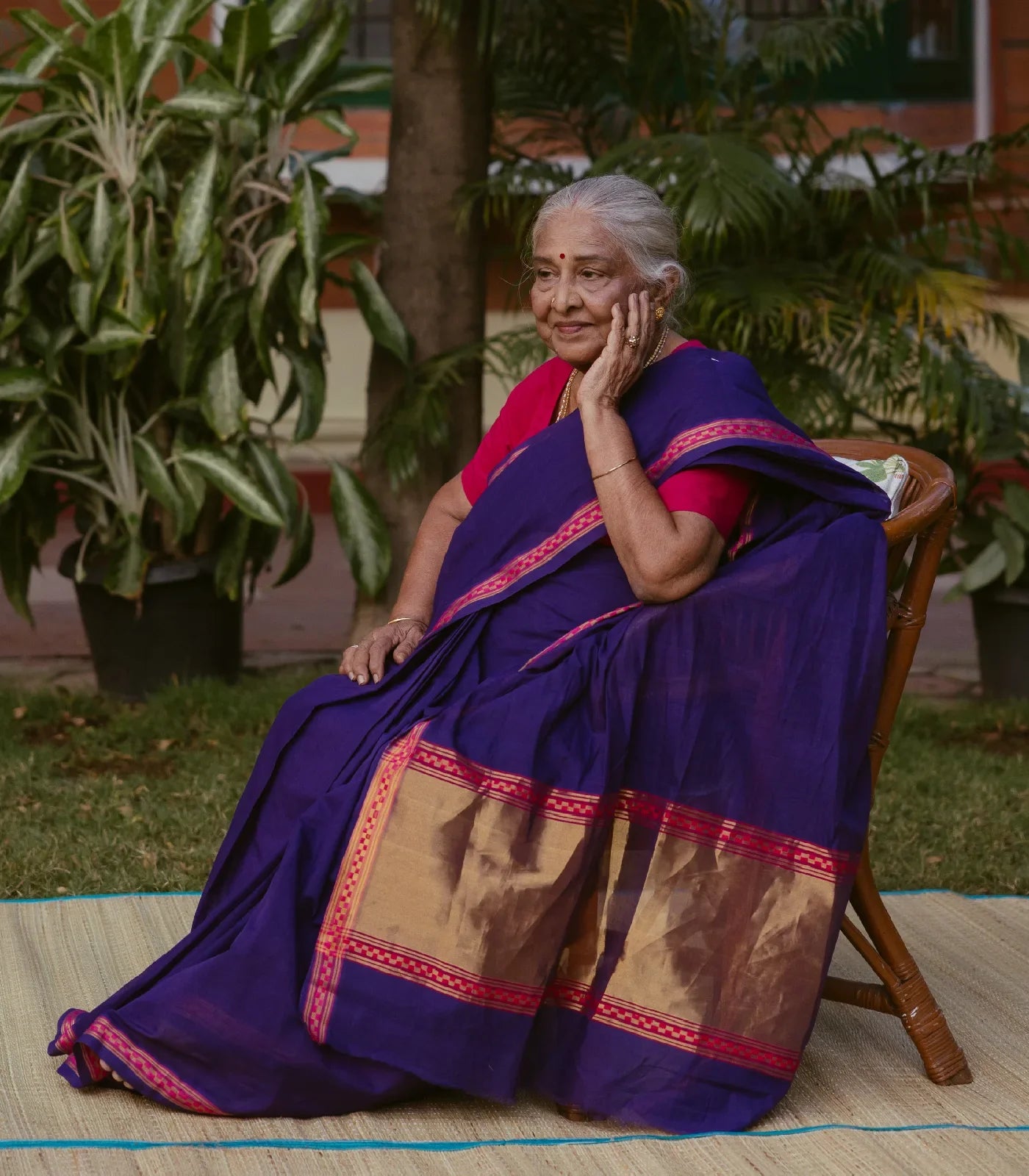 Violet Handloom Venkatagiri Cotton Saree With Border in a checkered pattern