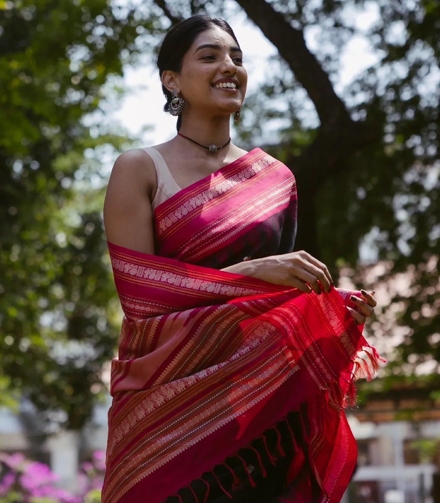 Black Handloom Korvai Kanchi Cotton Saree With Annam And Rudaksham Motifs in A Pink Border