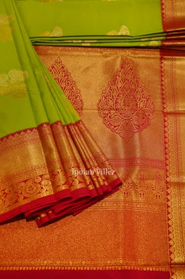 Parrot Green Brocade with Rani Pink Border Kanjivaram Silk Saree