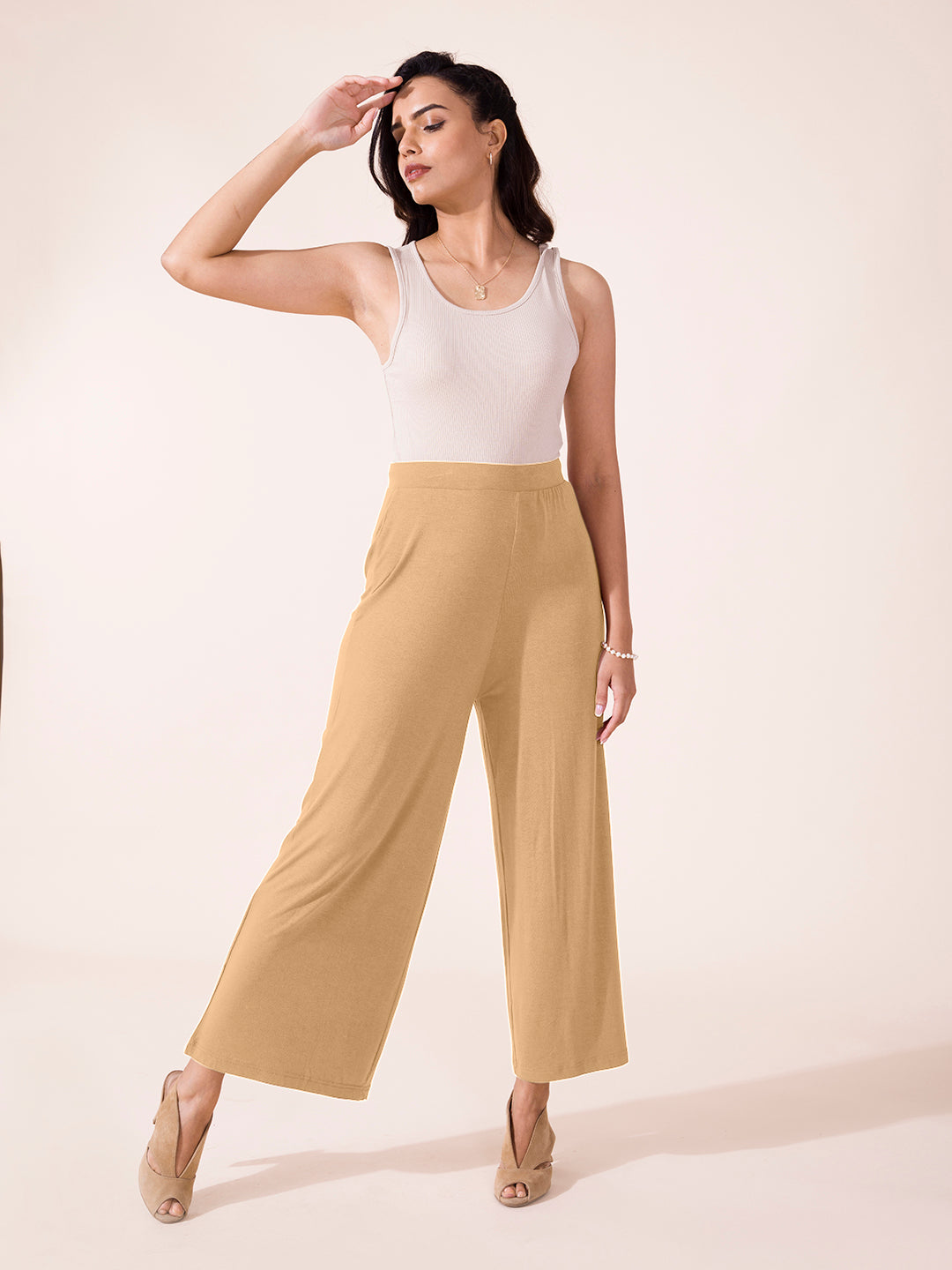 Women Solid Wheat Viscose Mid Rise Knit Palazzos