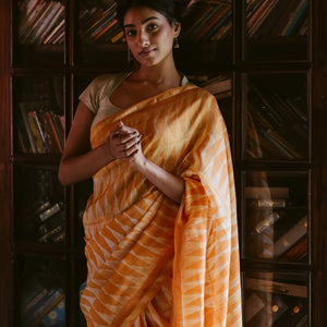 Orange Handloom Chanderi Cotton Saree With Triangular motifs in Shibori dyed technique