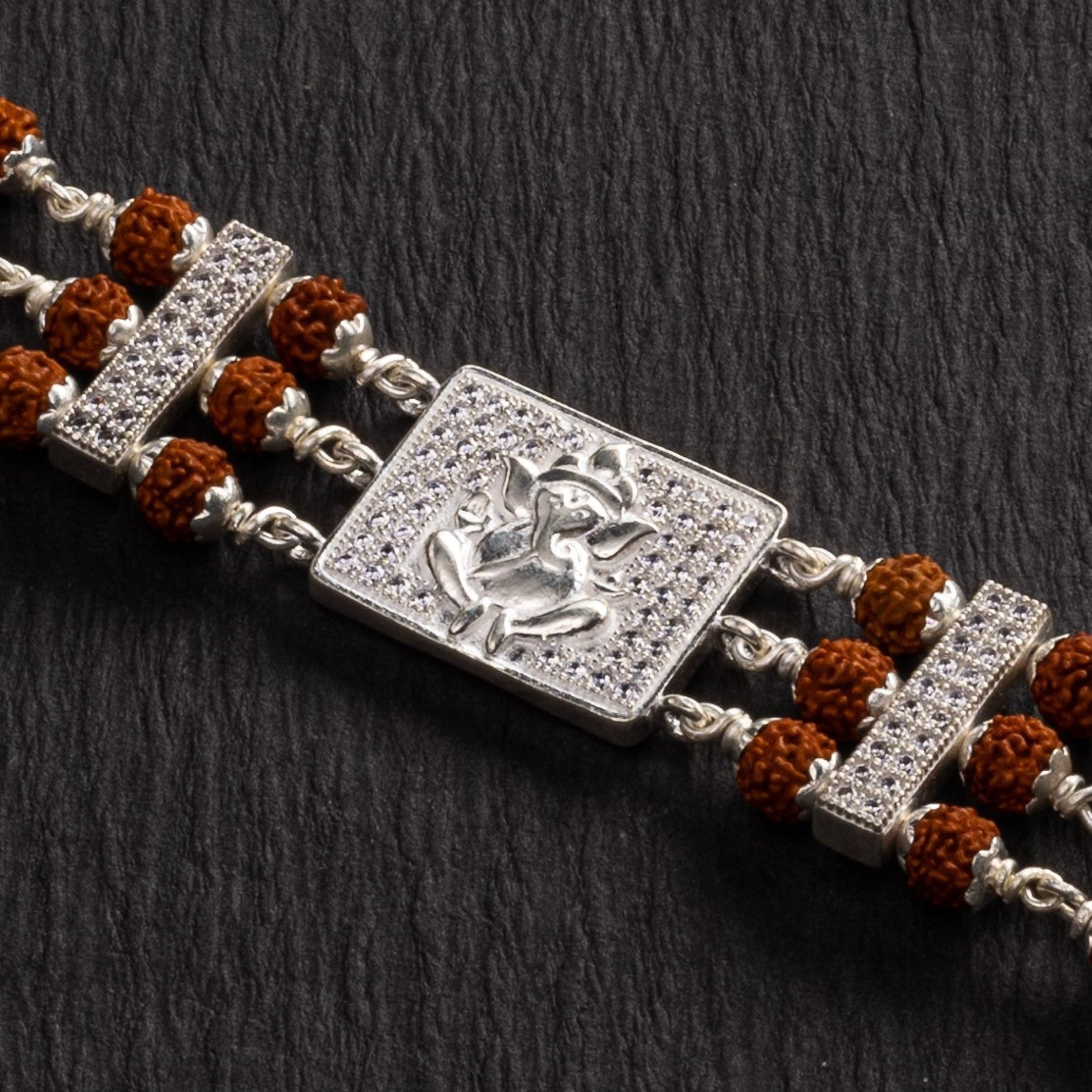 Rudraksha Silver Brooch Ganesh Triple Line Bracelet