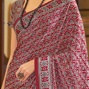 Maroon Floral Ajrakh Printed Satin Saree With Tassels