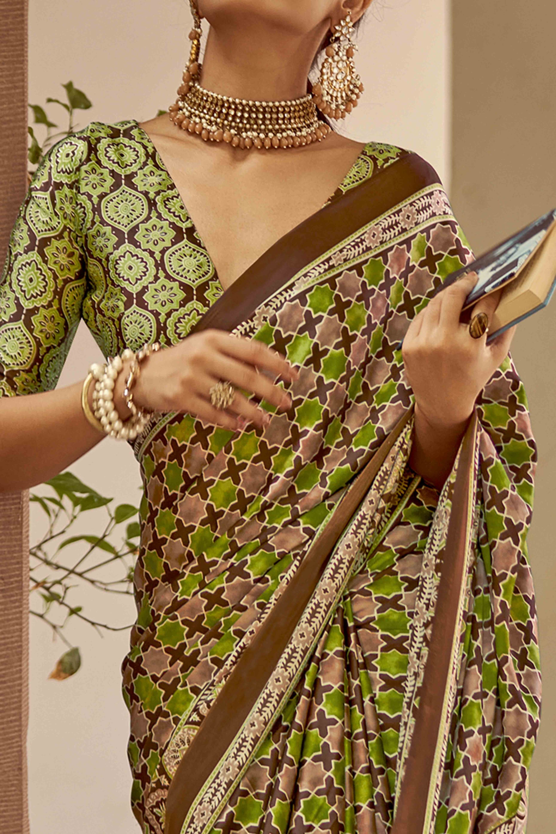 green-geometric-ajrakh-printed-satin-saree-with-tassels-4