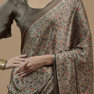 Brown Floral Ajrakh Printed Satin Saree With Tassels