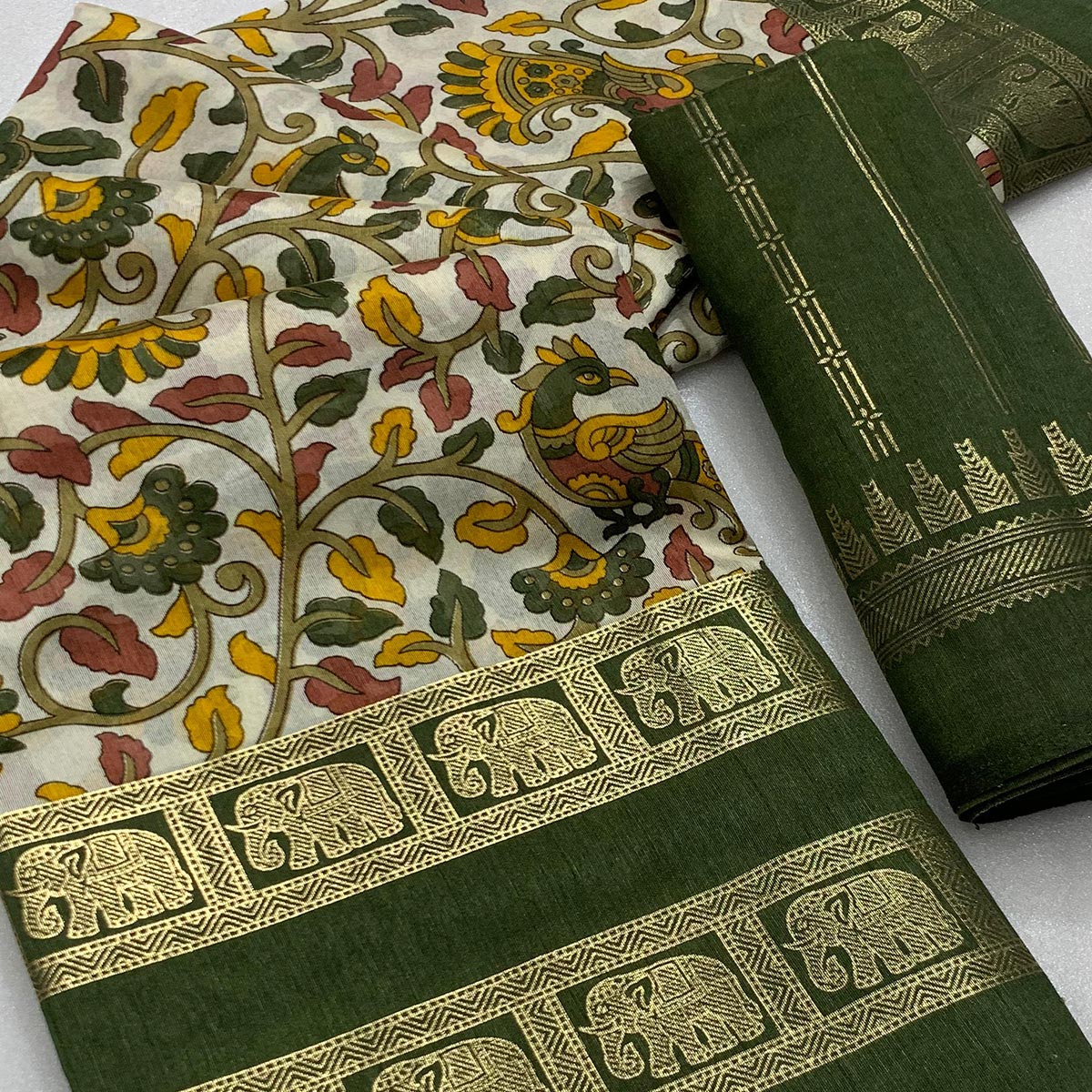 green-kalamkari-printed-dola-silk-saree