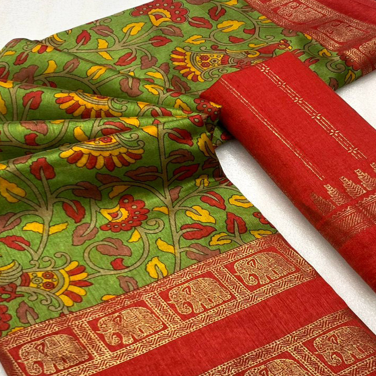 green-floral-kalamkari-printed-dola-silk-saree