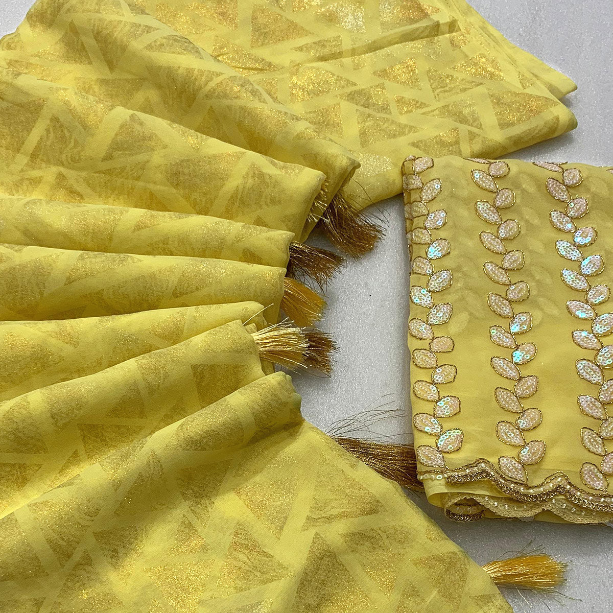Lemon Yellow Geometric Foil Printed Georgette Saree With Tassels