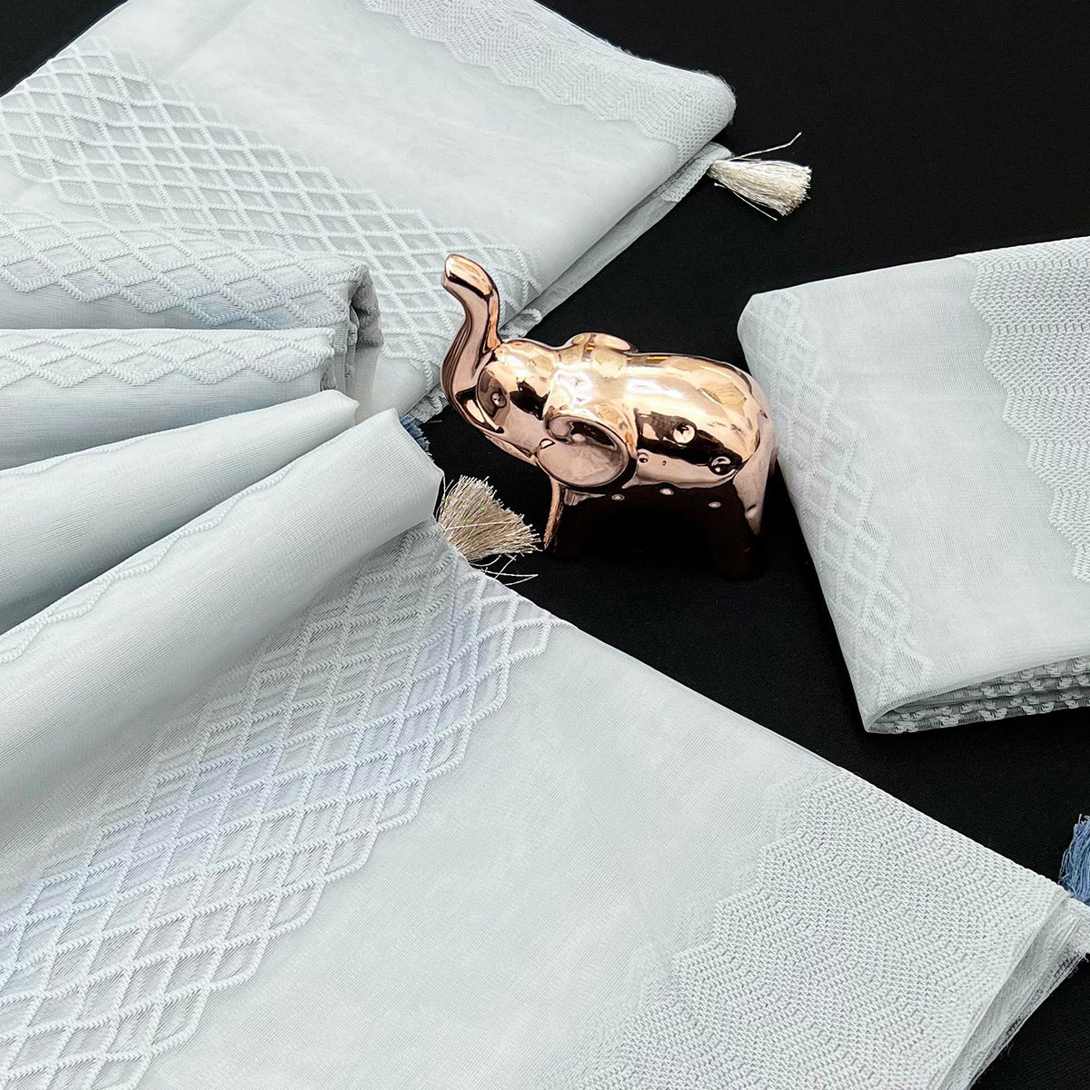 Grey Woven Thread Work Net Saree With Tassels