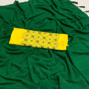 green-zari-woven-georgettte-saree-with-tassels