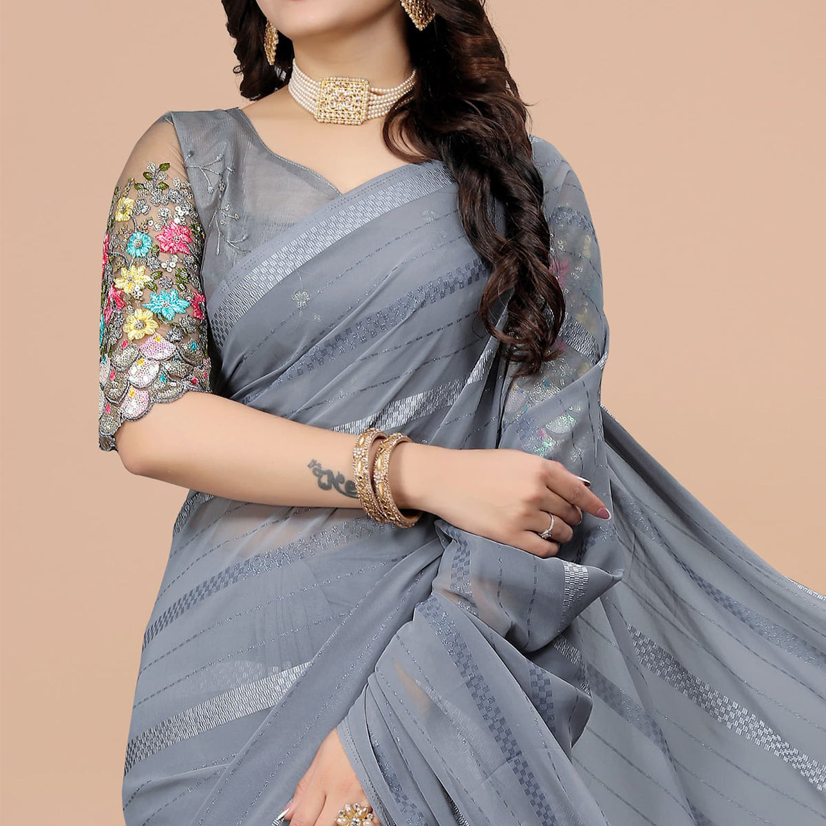 Grey Zari Woven Georgette Saree With Tassels