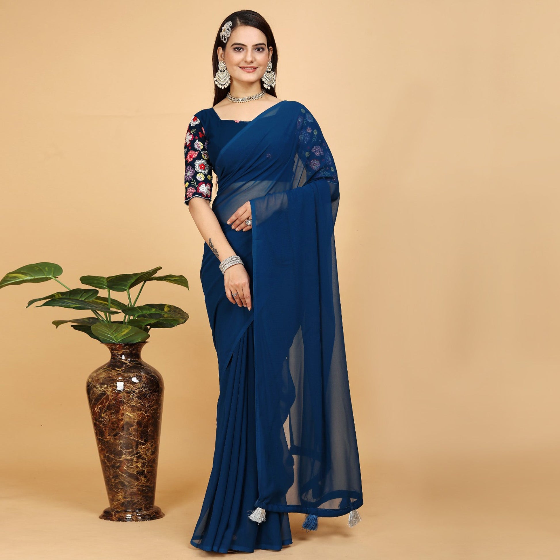 Blue Solid Georgette Saree With Tassels