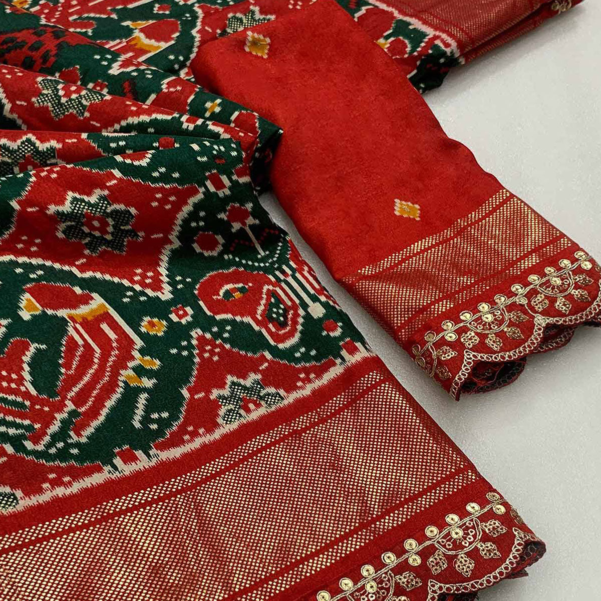 green-red-ikkat-printed-dola-silk-saree-with-sequins-embroidery-border